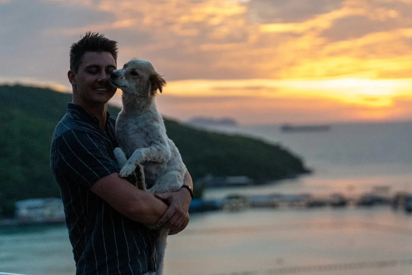 Luke and his dog Charlie at sunset